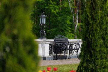 Wooden benches and chaise lounges for rest on the streets of the city and in the park, public places