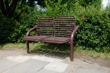 Wooden benches and chaise lounges for rest on the streets of the city and in the park, public places