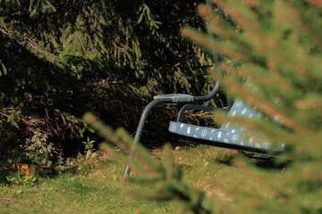 Wooden benches and chaise lounges for rest on the streets of the city and in the park, public places