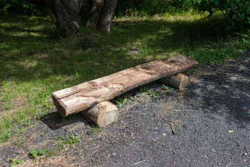 Wooden benches and chaise lounges for rest on the streets of the city and in the park, public places