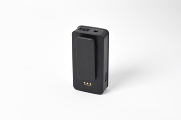 Wireless microphone transmitter and receiver set, black color, compact design with belt clips, isolated on white background