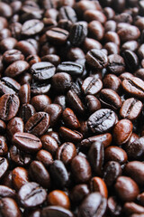 Pile of roasted coffee beans. Coffee beans background