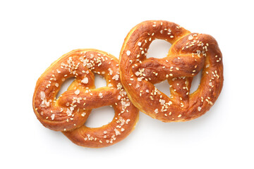 Fototapeta premium Tasty pretzels with salt isolated on white, top view
