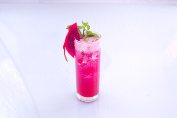 dragonfruit cocktail with lime and mint. Isolated from white background. Perfect for menu, advertising or commercial use