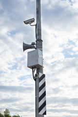 A camera for photo and video recording on the road and an alert system