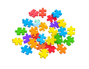 Colorful jigsaw puzzle pieces scattered, forming a cluster