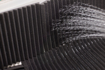 Waterproof Acoustic Foam Panel Designed for Use in a Shower Setting to Enhance Sound