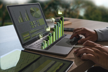 Sustainable Business Practices image shows person working laptop with digital graphs and charts, indicating data analysis and growth