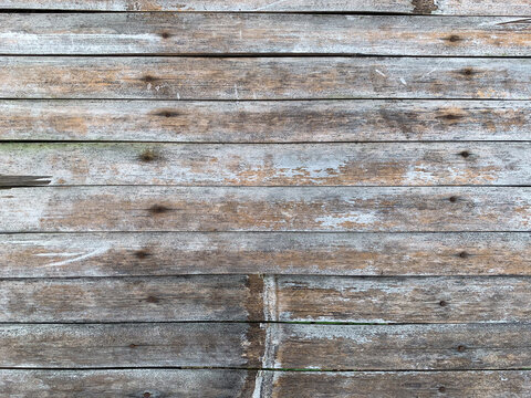 Weathered rustic wooden wall texture background
 - Powered by Adobe