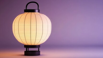 Fototapeta premium Paper lantern-inspired lamp glowing on pale lilac flat surface