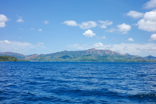 A beautiful scenery of a mountain range in the background with deep blue ocean of Coron, Parawan. A paradise on earth and favorite tourist destination in the Philippines, Asia