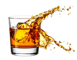 Amber liquid splashing from a rocks glass with ice