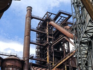 Rusty steel pipes in giant industrial complex near Ostrava Vitkovice and Bolt Tower, famous urbex...