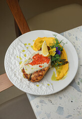 Seafood dinner plate with lobster and greens