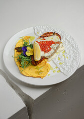 Elegant lobster entrée with herbs and lemon