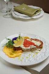 Grilled lobster with vibrant vegetable side