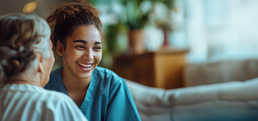 A home health care worker assists an elderly woman in her home