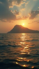 Naklejka premium Golden Sunlight Reflections on Ocean Waves with Mountain Silhouette Backdrop at Dusk