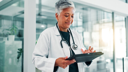 Hospital, doctor and mature woman on tablet for telehealth, medical service online report....