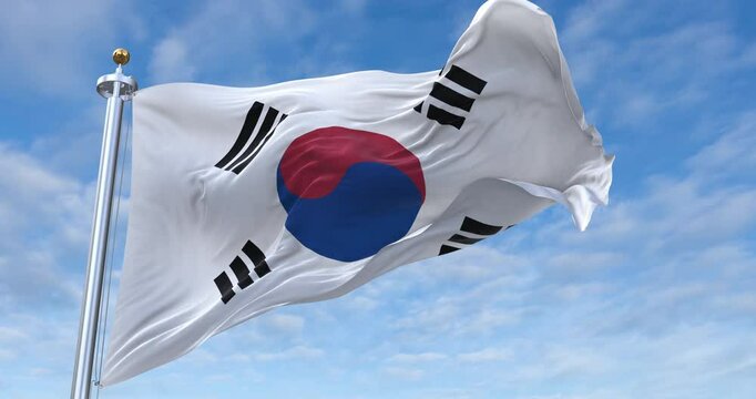 South Korea flag with flagpole waving in wind, rolling clouds background looping, 4K video (Perfect Loop)