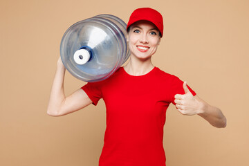 Delivery girl employee woman wear red cap t-shirt uniform workwear work as dealer courier hold big...