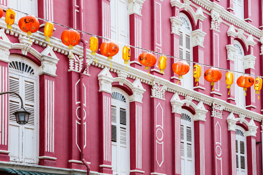 Pink facade of an old building, Chinatown district, Singapore city