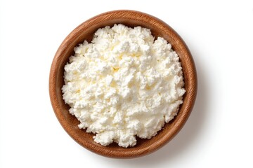 Wooden bowl filled with crumbled cottage cheese