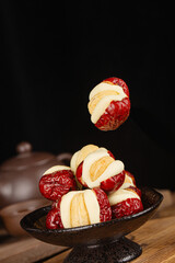 Chinese specialty snack - cashew nut puffs and dates