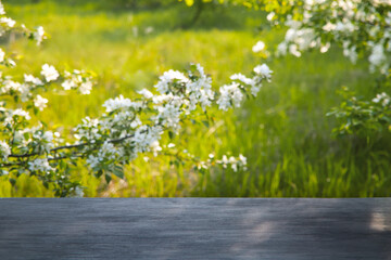 Spring blossoms on wooden table a serene nature scene for relaxation