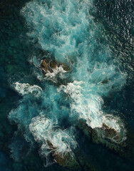 Aerial View of the Sea and Waves. The vast ocean stretches endlessly, with waves. Nature, tranquility, and adventure. 