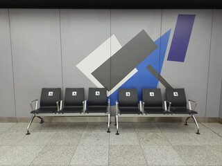 Seats for passengers with disabilities at the airport.