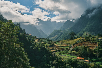 Green Mountains of Madeira with Charming Village Views. Lush forests blanket the hills. Nature, culture, and island life.	