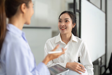 Positive Engagement in Architecture. Two engineers sharing ideas in a collaborative meeting.