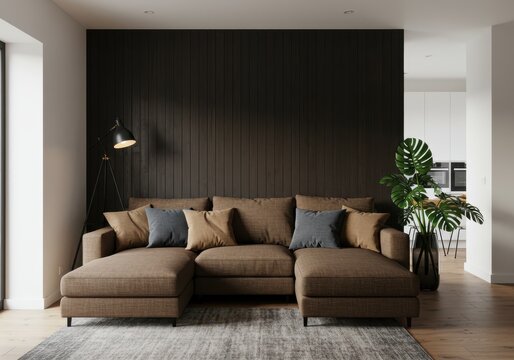 A brown sectional sofa with pillows sits in a modern living room with dark wood paneling