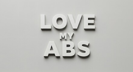 White Letters Spelling Love My Abs on Gray Background