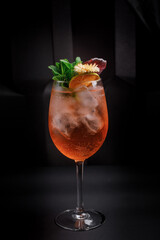 alcoholic cocktails on a dark background