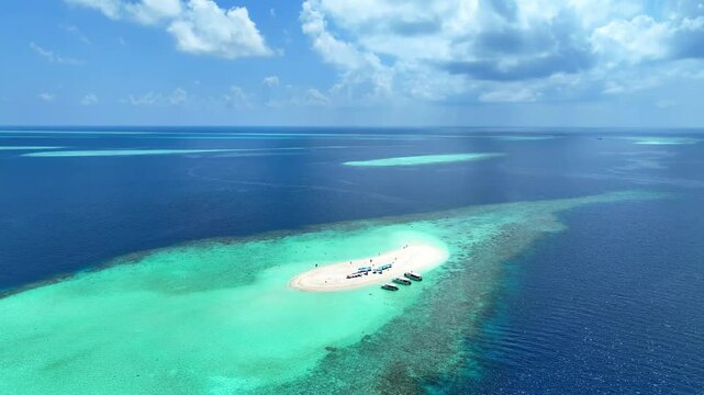 Summer lagoon Ripples in the sand at low tide on a beach with sandbar and blue sea in Maldives island	