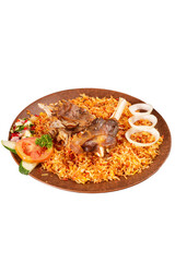 Biryani rice served with grilled lamb or mutton, sliced of onion, pickles. Serves on brown plate with gravy and sauce. Perfect for menu, advertising or commercial use