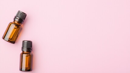 A pink solid background featuring a clean essential oil bottle, ideal for beauty and wellness themes.