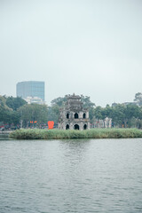 Turtle Tower on Hoan Kiem Lake in cloudy weather, landmark of Hanoi, Vietnam