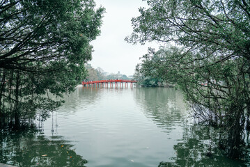 Hoan Kiem Lake Sunrise Bridge in cloudy weather, landmark of Hanoi, Vietnam