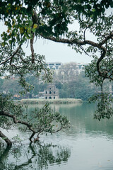 Turtle Tower on Hoan Kiem Lake in cloudy weather, landmark of Hanoi, Vietnam