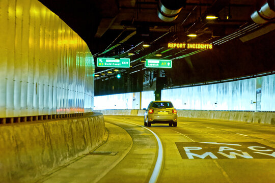 Car exiting an underground tunnel keeping a safe following distance
