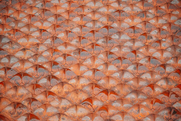 The tiled roof of the pagoda at the Temple of Literature after the rain in Hanoi, Vietnam. Abstract background