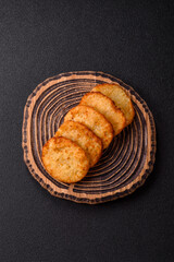 Potato hash browns, a meal with onions, cabbage in the form of fritters