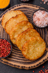 Potato hash browns, a meal with onions, cabbage in the form of fritters