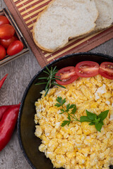 Scrambled eggs in metal pan