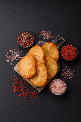 Potato hash browns, a meal with onions, cabbage in the form of fritters
