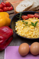 Scrambled eggs in metal pan