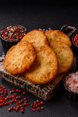 Potato hash browns, a meal with onions, cabbage in the form of fritters